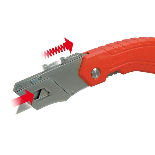 STANLEY 0-10-243 utility knife with red handle, close-up side angle showing blade release mechanism.