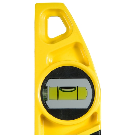 Close-up of a yellow spirit level showing the bubble within a horizontal vial.