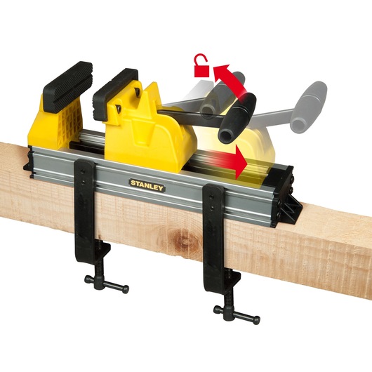 STANLEY 0-83-179 bar clamp photography, yellow and black clamp fixed to wood, side angle.