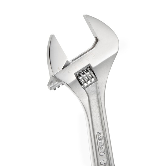 Close-up of a silver adjustable wrench with measurement markings on the jaw, STANLEY brand.
