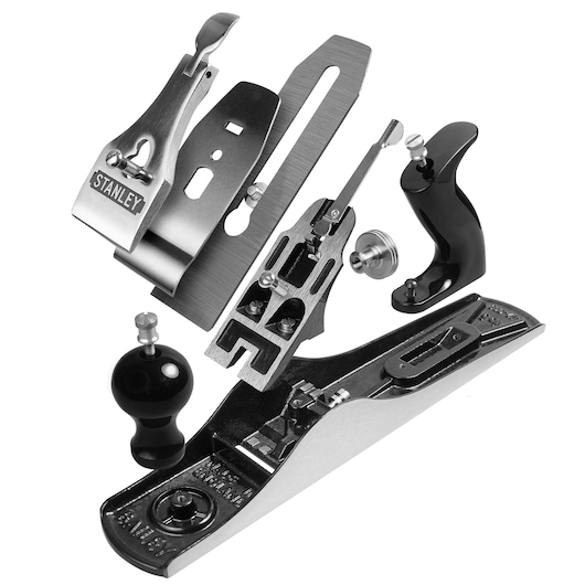 Disassembled STANLEY hand plane showing separate metal and plastic parts on a white background.