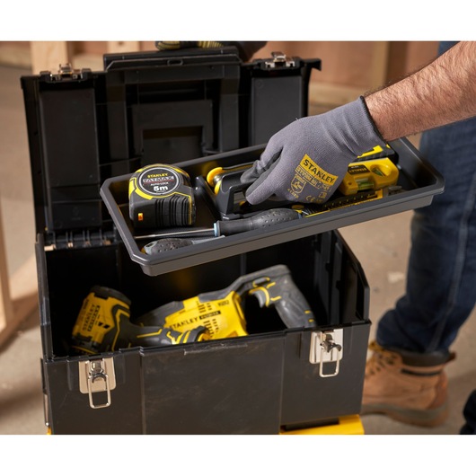 STANLEY 1-70-326 toolbox with hand lifting tray containing tape measure and tools, construction setting.
