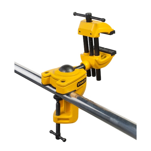 STANLEY 1-83-069 photography of adjustable yellow multi-angle bench vise on white background, side view.