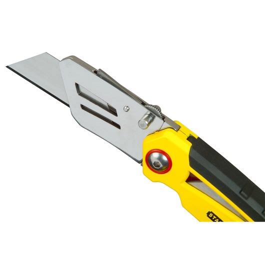 Photo of STANLEY FMHT0-10827 folding utility knife with a yellow and black handle, blade extended, side angle.