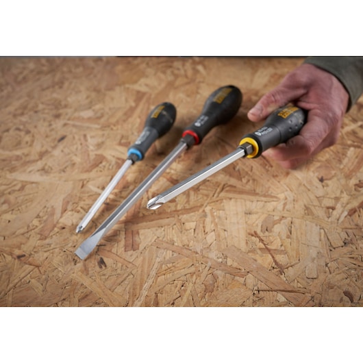 STANLEY FMHT0-62623 screwdriver set with ergonomic handles on wooden surface, side angle.
