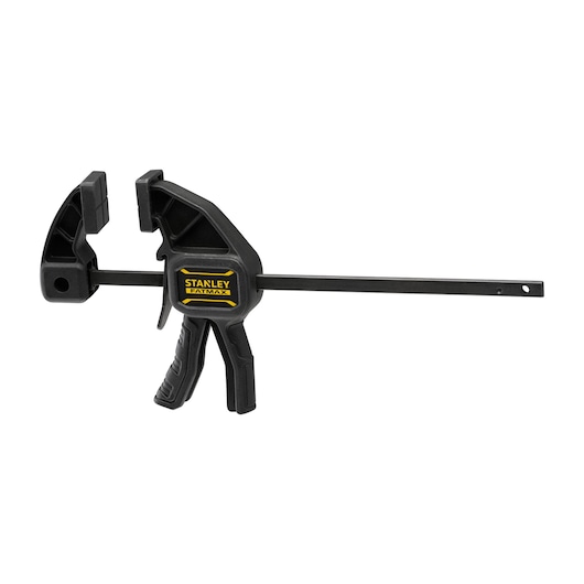 Stanley FMHT0-83231 photography of black trigger clamp tool, side angle, yellow logo detail visible.