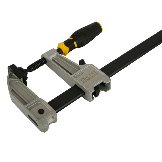 Photo of STANLEY FMHT0-83244 metal bar clamp with black and yellow handle, angled on white background.
