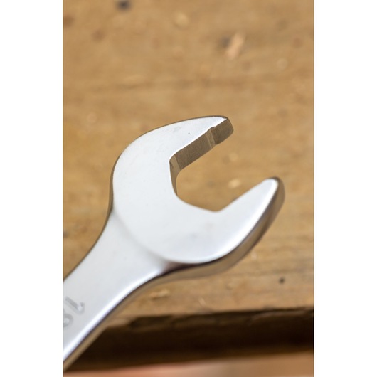 STANLEY FMMT13031-0 open-end wrench, photography of front angle on wood surface.