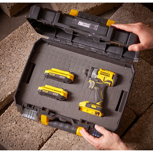 STANLEY FMST1-71966 photography of tool case with impact driver and two batteries, top view