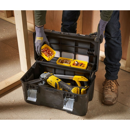 STANLEY FMST1-75792 toolbox with metal latches, open to show organized hand tools and hardware accessories, angled view.
