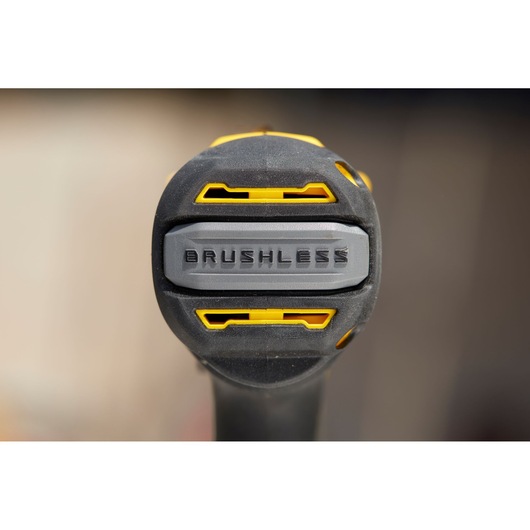 STANLEY SFMCD715D2K brushless drill close-up, yellow and black details, photography.