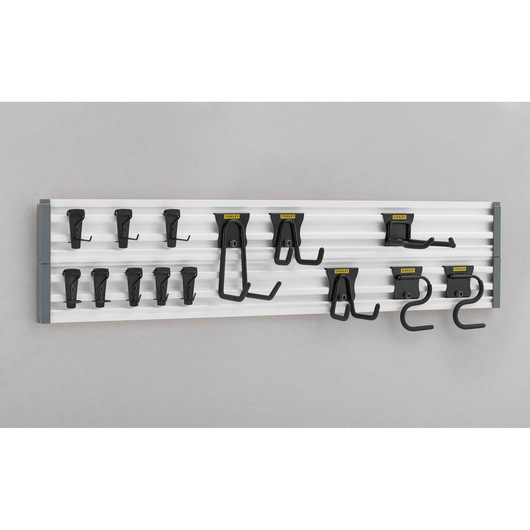 STANLEY STST22000-1 wall-mounted tool organizer with multiple black hooks, front angle.