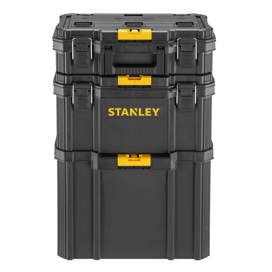Photo of STANLEY STST83319-1 black modular tool box stack with yellow latches, front angle, product photography.