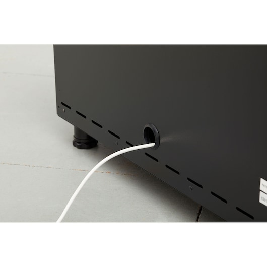 STANLEY STST97595-1 cabinet photography, rear view showing cable port and white cable.