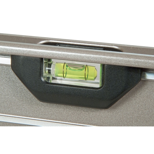 STANLEY XTHT1-42131 spirit level close-up, showing green vial and silver body on white background.